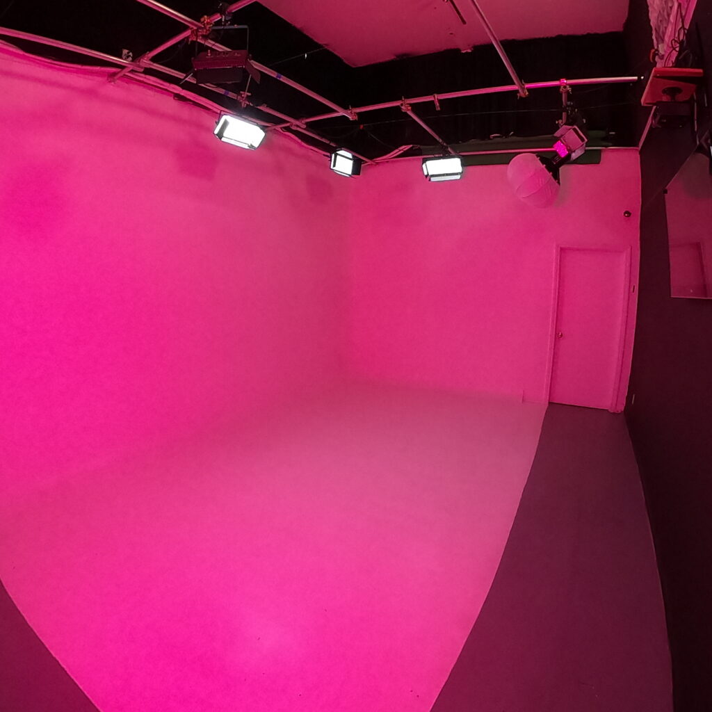 Inside-Mainstream-entertainment-studio rent hollywood soundstage film-photography-studio lit rose red with RGB 2000 panel Led lights - MainStream Entertainment - MainStream Entertainment