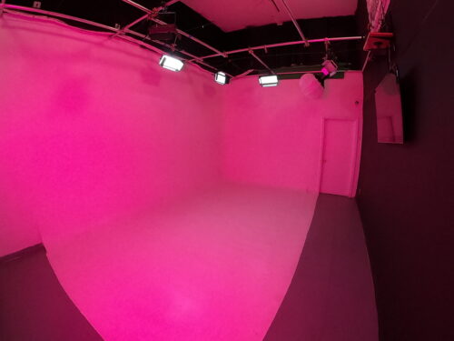 Inside-Mainstream-entertainment-studio rent hollywood soundstage film-photography-studio lit rose red with RGB 2000 panel Led lights