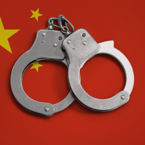 China flag and police handcuffs The concept of observance of the law in the country and protection from crime